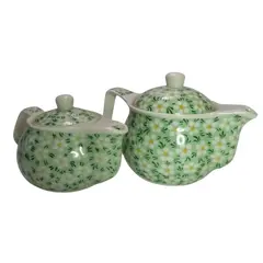 Foto de um(a) Mini Bules, da categoria de Bules. Mini bule e chaleira (+ peneira) em porcelana policromada. Dimensões: A bule menor 8cm / Diâmetro 9cm / Peso: 280g A bule... Vendido no marketplace Trésors.