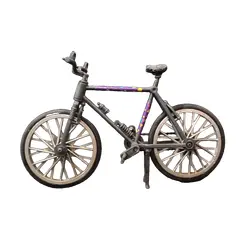Foto de um(a) Mini Bicicleta anos 90, da categoria de Outros colecionáveis. Miniatura de bicicleta em plástico com pneus em borracha. Sem marca do fabricante, década de 1990 A: 16,5 cm L: 26,5 cm P:... Vendido no marketplace Trésors.