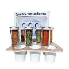 Foto de um(a) Porta Temperos, Década de 2000, da categoria de Saleiros e pimenteiros. Porta temperos em melamina policromada com 6 frascos de vidro com tampa, década de 2000. Embalagem original. Frascos: A 9,5... Vendido no marketplace Trésors.
