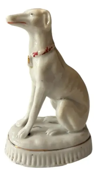 Foto de um(a) Antigo Bibelô Escultura Cachorro Galgo Em Porcelana Alemã, da categoria de Escultura. Antigo e gracioso bibelô decorativo em porcelana artística alemã, representando cão da raça galgo. Peca muito colecionável,... Vendido no marketplace Trésors.