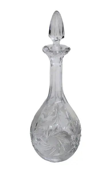 Foto de um(a) Garrafa Licoreira em cristal, da categoria de Garrafas. Licoreira em cristal translúcido, com farta lapidação. em baixo relevo. Medidas 31 cm de altura. Em bom estado, com marcas... Vendido no marketplace Trésors.