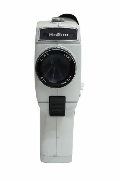 Foto de um(a) Antiga filmadora HALINA SUPER EIGHT, da categoria de Câmeras fotográficas. Antiga filmadora da marca HALINA SUPER EIGHT, fabricada em Hong Kong pela W.Hanking Entrerprises ltd entre 1968/1972.... Mostrado de uma perspectiva diferente. Vendido no marketplace Trésors.