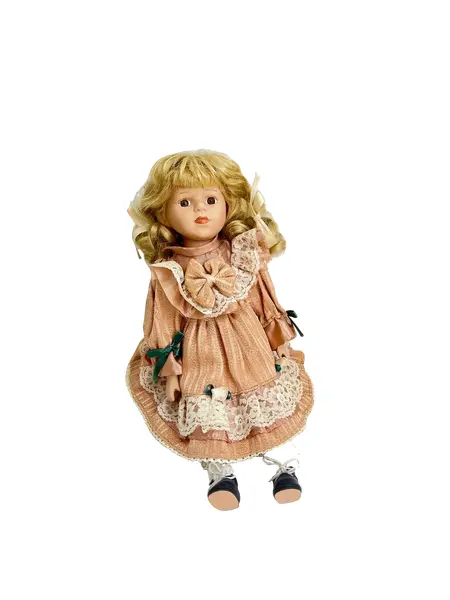 Foto de um(a) ​Boneca de porcelana, da categoria de Brinquedos e Hobbies. Boneca de porcelana com leves marcas do tempo e uso. Com suporte. Medidas: 30x16cm. Vendido no marketplace Trésors.