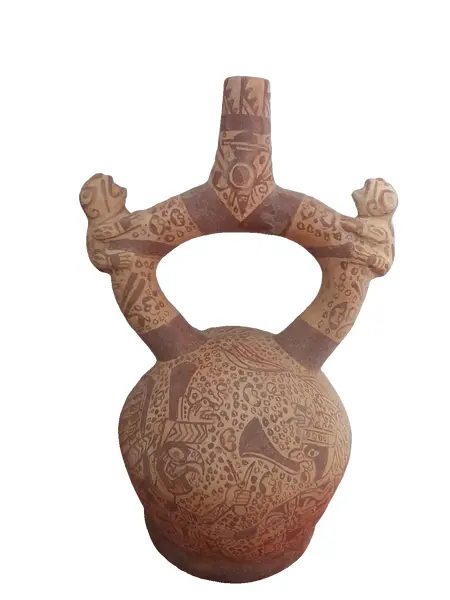 Foto de um(a) Cultura pré-inca, vaso cerimonial, da categoria de Outros colecionáveis. Jarro cerimonial com duas alças e um único bico; ambas as alças apresentam a figura de um macaco agarrado a elas; na parte... Vendido no marketplace Trésors.