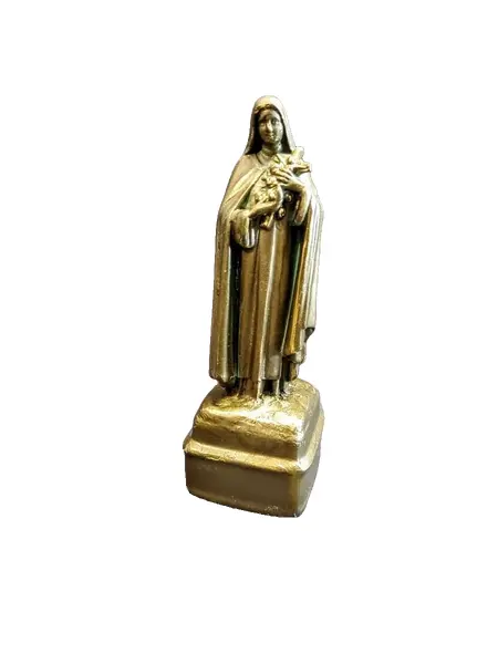 Foto de um(a) Imagem Santa Rita Antimônio Década de 1940, da categoria de Objetos religiosos e espirituais. Imagem de santa rita em antimônio com pátina bronze oxidada, década de 1940. A: 15,5 cm / L: 5 cm / P: 5 cm / peso: 280g. Vendido no marketplace Trésors.