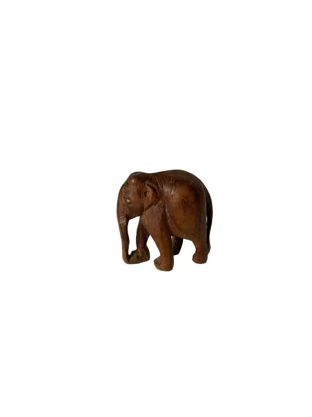 Foto de um(a) Escultura de elefante, da categoria de Modelos e estatuetas. Pequeno elefante esculpido na madeira Mede: 6 x 5 cm. Vendido no marketplace Trésors.