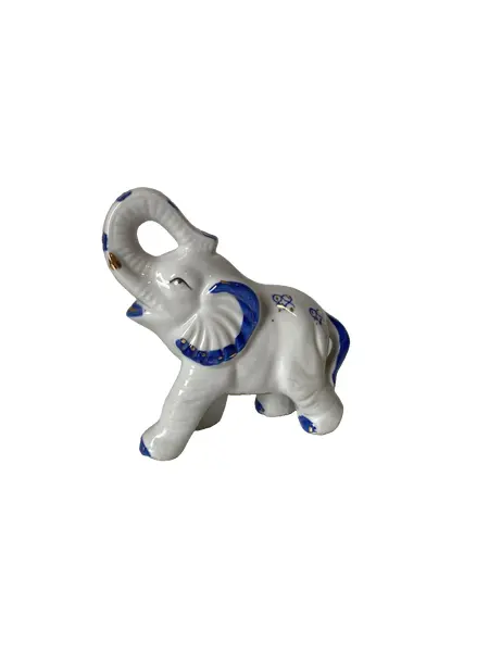 Foto de um(a) Bibelô de elefante, da categoria de Modelos e estatuetas. Bibelô elefante em porcelana 13 cm altura, 13 cm diâm. Vendido no marketplace Trésors.