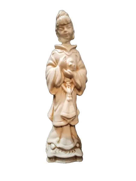 Foto de um(a) Escultura Japonesa Cerâmica 80'S, da categoria de Modelos e estatuetas. Escultura japonesa em cerâmica, década de 1980 A: 24 cm L: 7 cm P: 7 cm peso: 250 g. Vendido no marketplace Trésors.
