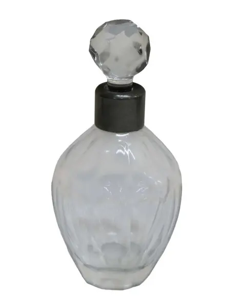 Foto de um(a) Perfumeiro de cristal, da categoria de Garrafas, potes e jarros. Delicado perfumeiro antigo, em cristal translúcido com lapidações facetadas e gargalo em metal prateado. Tampa também com... Vendido no marketplace Trésors.