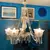 Foto de um(a) Lustre para 5 luzes em cristal francês Neoclássico, da categoria de Lustres. Magnífico e antigo lustre para 5 luzes em cristal francês, estilo "Neoclássico". Corpo com gomados diversos. Braços em "S"... Mostrado de uma perspectiva diferente. Vendido no marketplace Trésors.