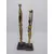 Foto de um(a) Par de esculturas africanas em madeira, da categoria de Escultura. Par de esculturas africanas em madeira, pintada à mão, retratando mulheres carregando baldes. Mede A: 31cm. Mostrado de uma perspectiva diferente. Vendido no marketplace Trésors.