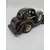 Foto de um(a) Calhambeque miniatura em madeira, da categoria de Carros e caminhões de brinquedo. Calhambeque miniatura em madeira, para colecionadores e apreciadores. Infelizmente está sem um dos faróis frontais. MEDINDO... Mostrado de uma perspectiva diferente. Vendido no marketplace Trésors.