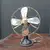 Foto de um(a) Ventilador 1919 AEG americano, da categoria de Objetos decorativos. Ventilador Aeg autêntico dos anos 1940. Importado, na cor preta original, com grade e hélice em metal polido. Além de ser um... Mostrado de uma perspectiva diferente. Vendido no marketplace Trésors.