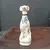 Foto de um(a) Escultura Portuguesa - Cachorro, da categoria de Escultura. Elaborada em Porcelana Portuguesa, esta escultura de um Cachorro Galgo exibe uma textura craquelada que lhe confere... Mostrado de uma perspectiva diferente. Vendido no marketplace Trésors.
