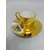 Foto de um(a) Xícara dourada porcelana Bavaria paisagem Genova, da categoria de Xícaras. Xícara avulsa com pires, porcelana Bavaria, em dourado com desenhos retratando a cidade de Genova, como o farol La Lanterna... Mostrado de uma perspectiva diferente. Vendido no marketplace Trésors.