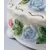 Foto de um(a) Porta-jóias floral, da categoria de Porta-Jóias. Delicado porta-jóia em porcelana branca (manufatura não identificada) com motivos florais em policromia pintados a mão. Mede... Mostrado de uma perspectiva diferente. Vendido no marketplace Trésors.