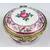 Foto de um(a) Porta-jóia, da categoria de Porta-Jóias. Pequeno porta-jóias em porcelana branca com motivo floral em policromia e metal dourado. Mede 5cm de diâmetro, mínimos... Mostrado de uma perspectiva diferente. Vendido no marketplace Trésors.