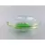 Foto de um(a) Petisqueira redonda em murano nacional, da categoria de Acessórios de cozinha. Petisqueira redonda em murano nacional. Translúcido com círculo verde na base que irradia cor para a petisqueira. Tem 5A x... Mostrado de uma perspectiva diferente. Vendido no marketplace Trésors.