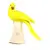 Foto de um(a) Escultura em porcelana na figura de ave amarela, da categoria de Escultura. Figura em porcelana de ave na cor amarela pousada sobre tronco creme. Bonita, mede 22A x 25 cm de comprimento. Mínimos,... Vendido no marketplace Trésors.