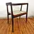 Foto de um(a) Cadeira "U" - Joaquim Tenreiro, da categoria de Cadeiras de jantar. Descubra o charme do design brasileiro moderno com a cadeira U de Joaquim Tenreiro! Esta cadeira / poltrona restaurada é um... Mostrado de uma perspectiva diferente. Vendido no marketplace Trésors.