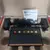 Foto de um(a) Console Atari Flashback 8, da categoria de Videogames e jogos de fliperama. Console Atari Flashback 8 Classic Game com 105 Jogos Atari. Mostrado de uma perspectiva diferente. Vendido no marketplace Trésors.
