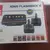 Foto de um(a) Console Atari Flashback 8, da categoria de Videogames e jogos de fliperama. Console Atari Flashback 8 Classic Game com 105 Jogos Atari. Mostrado de uma perspectiva diferente. Vendido no marketplace Trésors.
