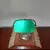 Foto de um(a) Luminária de mesa modelo Banker, da categoria de Abajures. Antiga luminária de mesa modelo BANKER para ambientes de leitura, escritório ou decoração com cúpula em vidro verde.... Mostrado de uma perspectiva diferente. Vendido no marketplace Trésors.