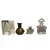 Foto de um(a) Coleção de raros frascos de perfumes franceses, da categoria de Garrafas, potes e jarros. Belíssima coleção de frascos de perfumes franceses (vazios). Sendo 4 de vidro transparente e 1 de cristal âmbar. Marca... Vendido no marketplace Trésors.