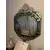 Foto de um(a) Espelho veneziano verde, da categoria de Outros objetos decorativos. Espelho Veneziano verde antigo. Moldura em vidro lapidado e entalhes florais. Mede: 110x80cm. Mostrado de uma perspectiva diferente. Vendido no marketplace Trésors.