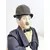 Foto de um(a) ​Boneco Charles Chaplin em porcelana e tecido, da categoria de Bonecos de arte. Boneco do Charles Chaplin em porcelana e tecido, com bengala em metal e chapéu em feltro. Marcas do tempo e uso mas sem nada... Mostrado de uma perspectiva diferente. Vendido no marketplace Trésors.