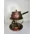 Foto de um(a) Rechand Fondue Cobre Completo, da categoria de Panelas. Aparelho de fondue clássico, completo e com acabamento em cobre martelado. Ideal para quem busca elegância e eficiência na... Mostrado de uma perspectiva diferente. Vendido no marketplace Trésors.