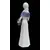 Foto de um(a) Escultura de dama em porcelana, da categoria de Escultura. Delicada escultura de dama com farto cachecol na tonalidade azul e carregando cesto no braço esquerdo. Peça bastante... Mostrado de uma perspectiva diferente. Vendido no marketplace Trésors.