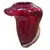 Foto de um(a) Vaso Murano Vermelho, da categoria de Vasos. Cada curva deste vaso conta uma história de fogo e sopro. Feito artesanalmente, este Murano carrega a alma da tradição... Mostrado de uma perspectiva diferente. Vendido no marketplace Trésors.