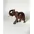 Foto de um(a) Elefante decorativo em madeira, da categoria de Escultura. Elefante decorativo esculpido em madeira. *Contém avaria em uma das orelhas, como mostra a foto. Mede: 17 x 15cm. Mostrado de uma perspectiva diferente. Vendido no marketplace Trésors.