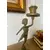Foto de um(a) Castiçal escultorico, da categoria de Castiçais. Castiçal em bronze. Mede: 21 cm altura. Mostrado de uma perspectiva diferente. Vendido no marketplace Trésors.