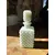 Foto de um(a) Antigo Perfumeiro Decorativo Em Opalina Francesa Branca, da categoria de Garrafas, potes e jarros. Antigo e lindo perfumeiro em opalina francesa. Todo original. Medidas 15x6cm. Mostrado de uma perspectiva diferente. Vendido no marketplace Trésors.