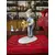 Foto de um(a) Antigo Bibelô Figurine De Menino Com Pássaro Porcelana Alemã, da categoria de Escultura. Antiga figurine/bibelô em porcelana artística alemã. Cores típicas de meados do século XX. Muito decorativa e colecionável.... Mostrado de uma perspectiva diferente. Vendido no marketplace Trésors.
