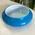 Foto de um(a) Antigo Bowl Art Deco Em Murano Leitoso Opalina Azul, da categoria de Centro de mesa. Altura 5cm Diâmetro 14cm. Mostrado de uma perspectiva diferente. Vendido no marketplace Trésors.