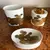 Foto de um(a) Antigo Raro Conjunto Cigarreira Isqueiro Cinzeiro Rosenthal, da categoria de Cigarreiras e piteiras. Rosenthal. Antigo e especial conjunto para fumantes. Composto de isqueiro, caixa cigarreira e cinzeiro. Feitos em porcelana... Mostrado de uma perspectiva diferente. Vendido no marketplace Trésors.