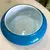 Foto de um(a) Antigo Bowl Art Deco Em Murano Leitoso Opalina Azul, da categoria de Centro de mesa. Altura 5cm Diâmetro 14cm. Mostrado de uma perspectiva diferente. Vendido no marketplace Trésors.