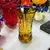 Foto de um(a) Antigo Vaso Cristal Tcheco Âmbar Lapidação Dedão Art Deco, da categoria de Vasos. Antigo e lindo vaso em cristal Europeu, doublé na cor âmbar. Lapidado à mão, lapidação dedão, fundo estrelado. Art... Mostrado de uma perspectiva diferente. Vendido no marketplace Trésors.