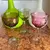 Foto de um(a) Antigas Taças Para Vinho Em Cristal Francês Colorido, da categoria de Taças. Antigo trio de finas taças de pé alto para vinho tinto, cristal europeu lapidado à mão. Medidas 17 x 8cm cada. Mostrado de uma perspectiva diferente. Vendido no marketplace Trésors.