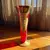 Foto de um(a) Antigo Vaso Jarro Artístico Cristal Veneziano Com Ouro, da categoria de Vasos. Antigo vaso artístico em cristal veneziano cor vermelho rubi , toda trabalhada à mão, decoração floral em relevo e ouro 18k.... Mostrado de uma perspectiva diferente. Vendido no marketplace Trésors.