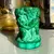 Foto de um(a) Malaquita Cristal Vasinho Malachite Glass Heinrich Hoffman, da categoria de Vasos. Malachite Glass by Heinrich Hoffmann. Antigo e pequeno vasinho em cristal de malaquita, todo lapidado à mão, como se fosse... Mostrado de uma perspectiva diferente. Vendido no marketplace Trésors.