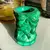 Foto de um(a) Malaquita Cristal Vasinho Malachite Glass Heinrich Hoffman, da categoria de Vasos. Malachite Glass by Heinrich Hoffmann. Antigo e pequeno vasinho em cristal de malaquita, todo lapidado à mão, como se fosse... Mostrado de uma perspectiva diferente. Vendido no marketplace Trésors.