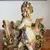 Foto de um(a) Antigo Bibelô Floreira Escultura Decorativa Biscuit Francês, da categoria de Escultura. Antiga floreira decorativa com figura de menina, peça artística toda feita e pintada à mão em biscuit francês. Início do... Mostrado de uma perspectiva diferente. Vendido no marketplace Trésors.