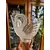 Foto de um(a) Antigo Vaso Centro De Mesa Cisne Cristal Francês Satiné, da categoria de Centro de mesa. Antigo e belíssimo vaso, centro de mesa em cristal francês, com decoração de cisnes em relevo. Ótimo tamanho para fazer... Mostrado de uma perspectiva diferente. Vendido no marketplace Trésors.