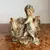 Foto de um(a) Antigo Bibelô Floreira Escultura Decorativa Biscuit Francês, da categoria de Escultura. Antiga floreira decorativa com figura de menina, peça artística toda feita e pintada à mão em biscuit francês. Início do... Mostrado de uma perspectiva diferente. Vendido no marketplace Trésors.