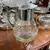 Foto de um(a) Antiga Rara Grande Jarra Refresqueira Art Deco Cristal E Wmf, da categoria de Jarros. WMF. Antiga e grande jarra refresqueira em cristal alemão ricamente lapidado à mão, bocal e alça em metal prateado da famosa... Mostrado de uma perspectiva diferente. Vendido no marketplace Trésors.