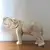 Foto de um(a) Antiga Grande Escultura Elefante Art Deco Faiança Tcheco (Usado), da categoria de Escultura. Grande escultura em faiança de procedência Czechoslovakia, representando elefante com a tromba levantada, que simboliza o... Mostrado de uma perspectiva diferente. Vendido no marketplace Trésors.
